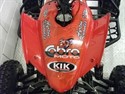 This is Ayrton's Cobra Factory ECX85, in his 2011 spec, this has been built in the KIK workshop and is by no means standard:

Red plastics
KIK Danger UK graphics kit
Fox Float EVOL front and rear shocks
Pro Taper handlebars
Cobra Factory ECX85 Engine
Black Wheels
Light carcase Tyres
